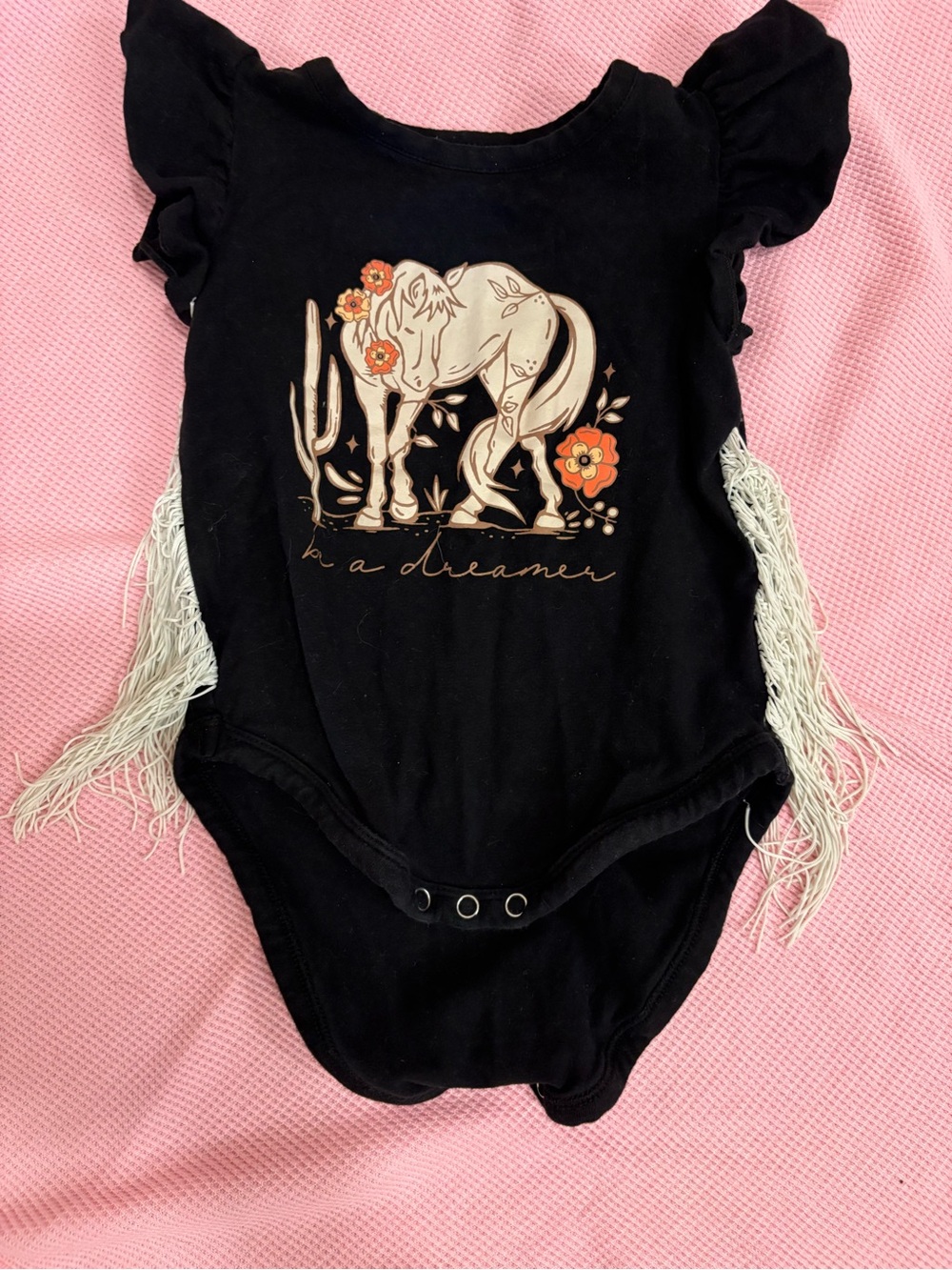 Black toddler One-Piece Bodysuit with Horse Graphic and Fringe Detail